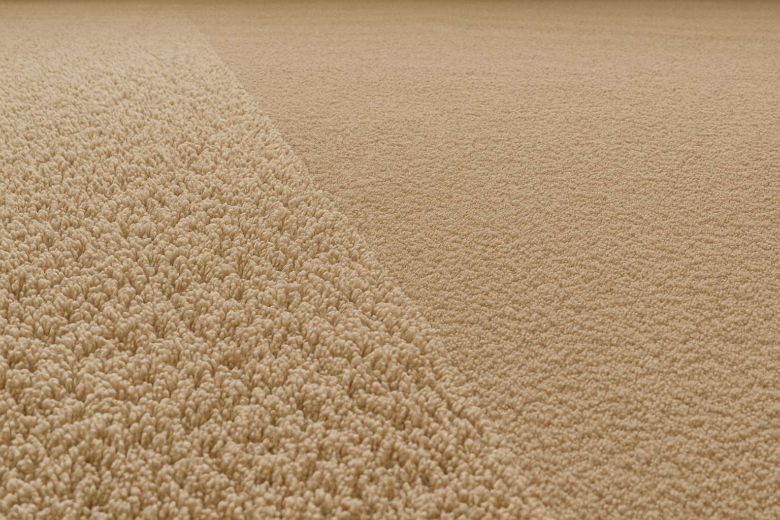 Before-and-after comparison of carpet fibers restored using a carpet rake.